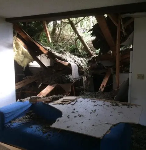 A room with a lot of debris on the floor